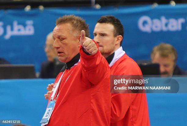 Poland's coach Michael Biegler gestures during the 24th Men's Handball World Championships quarterfinals match between Poland and Croatia at the Ali...