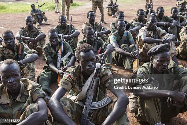 Opposition soldiers fighting under General Peter Gadet listen to General gadet give a talk at the SPLA Fourth Division Headquarters, a base the...