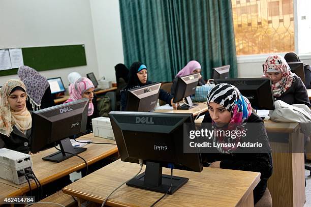 Women attend the Islamic University of Gaza, in Gaza City, October 22, 2011. The Islamic University is reputed to be one of the best universities in...