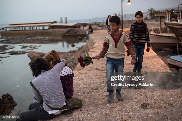 Syrian refugee family who fled Homs in January 2013 lives in a garage underground, where they collect, sort, and sell garbage to survive in Beirut,...