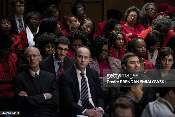 Members of the Delta Sigma Theta sorority and others listen while Loretta Lynch speaks during her confirmation hearing before the Senate Judiciary...