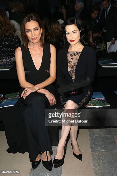 Nieves Alvarez and Dita von Teese attend the Elie Saab show as part of Paris Fashion Week Haute Couture Spring/Summer 2015 on January 28, 2015 in...