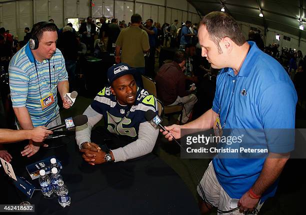 Defensive end Cliff Avril of the Seattle Seahawks speaks during a Super Bowl XLIX media availability at the Arizona Grand Hotel on January 28, 2015...