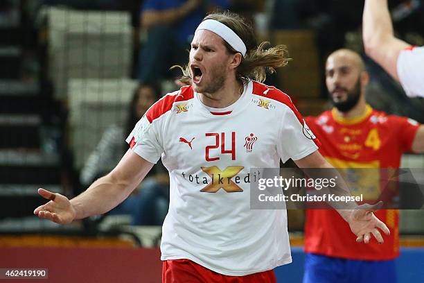 Mikkel Hansen of Denmark celebrates a goal during the quarter final match between Spain and Denmark at Lusail Multipurpose Hall on January 28, 2015...