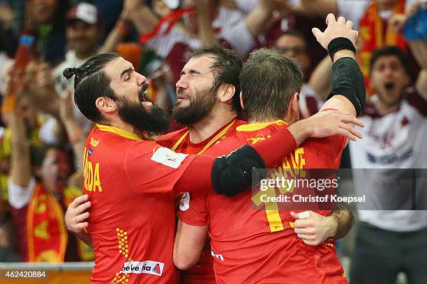 Jorge Maqueda, Joan Canellas and Julen Aguinagalde of Spain celebrate after winning the quarter final match between Spain and Denmark at Lusail...