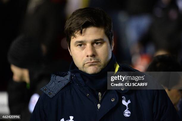 Tottenham Hotspur's Argentinian head coach Mauricio Pochettino arrives for the English League Cup semi-final second leg football match between...