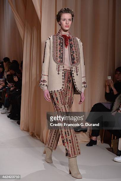 Model walks the runway during the Valentino show as part of Paris Fashion Week Haute Couture Spring/Summer 2015 on January 28, 2015 in Paris, France.