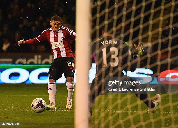 Che Adams of Sheffield United scores his first goal during the Capital One Cup Semi-Final Second Leg match between Sheffield United and Tottenham...