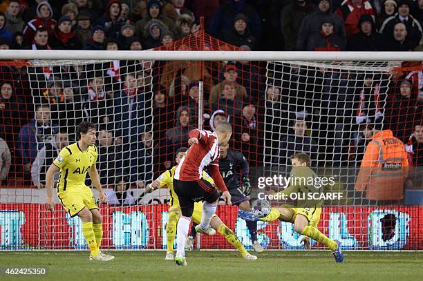 Sheffield United's English forward Che Adams scores his second and his team's second goal during the English League Cup semi-final second leg...