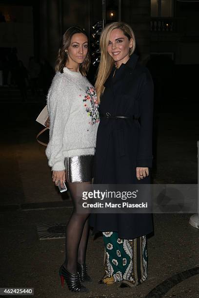 Guests arrive to attend the Valentino show as part of Paris Fashion Week Haute Couture Spring/Summer 2015 on January 28, 2015 in Paris, France.