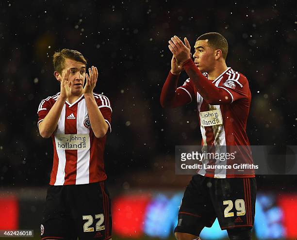 Louis Reed and Che Adams of Sheffield United applaud the fans after the Capital One Cup Semi-Final Second Leg match between Sheffield United and...