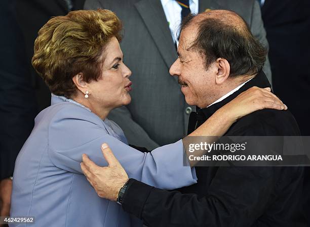 Brazilian President Dilma Rousseff greets Nicaragua's President Daniel Ortega during the III CELAC Summit 2015 family photo in the Pedregal building,...