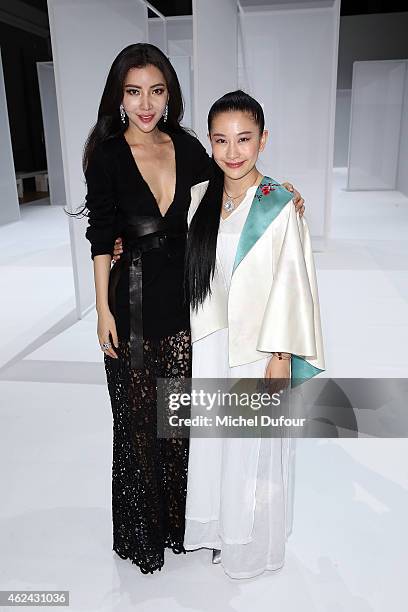 Lan Yu and guest attend the Lan Yu show as part of Paris Fashion Week Haute Couture Spring/Summer 2015 on January 28, 2015 in Paris, France.