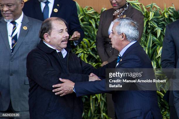 President Daniel Ortega of Nicaragua greets Presidente Otto Perez Molina form Guatemala during the IV Chiefs of State Summit as part of III Community...