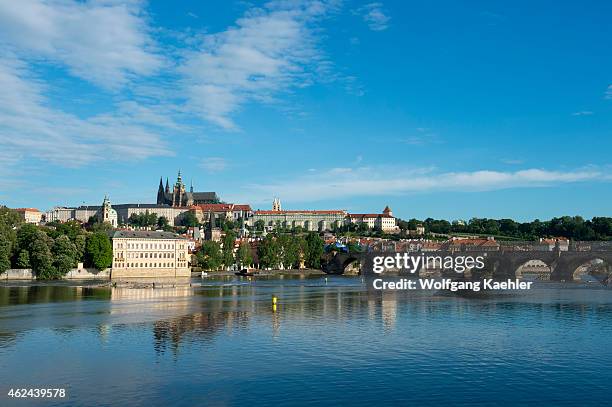 The Vltava River with Charles Bridge and Prague Castle in background in Prague, the capital and largest city of the Czech Republic.