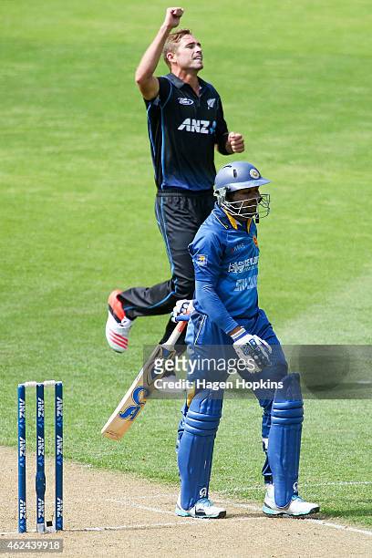 Tim Southee of New Zealand celebrates after taking the wicket of Tillakaratne Dilshan of Sri Lanka during the One Day International match between New...