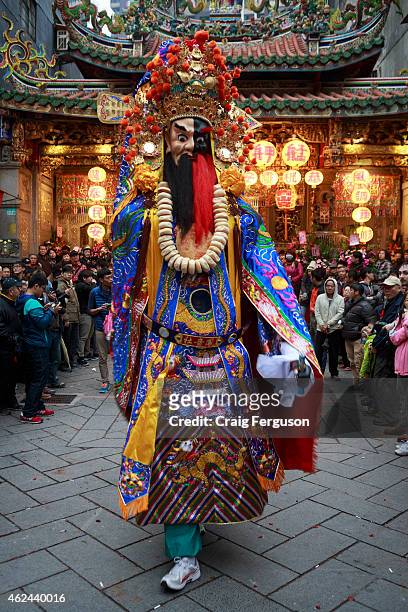 Giant God walks out of the Qingshan Temple on the second day of birthday celebrations for the Lord of the Green Mountain.