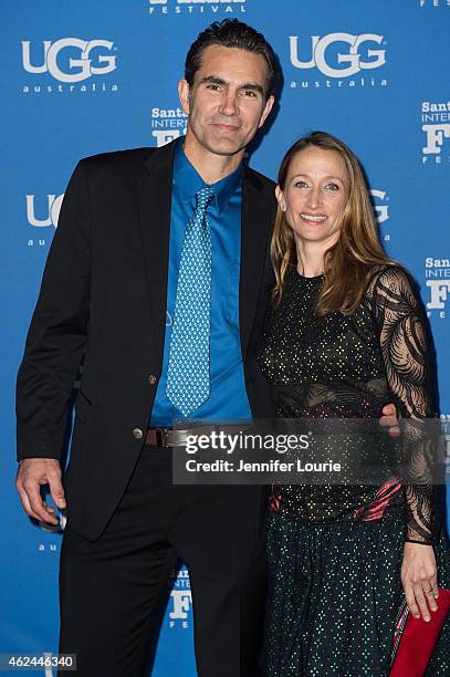 Actor Capkin Van Alphen and Celine Cousteau arrive at the "Attenborough Award" honoring the Cousteau family and world premiere screening of "Secret...