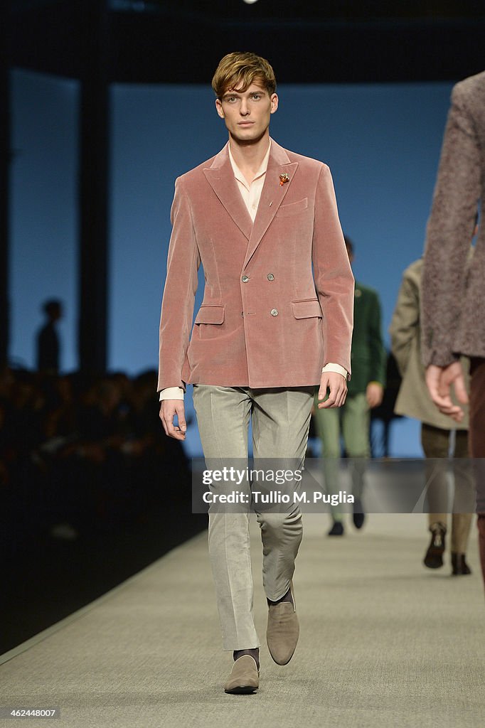 A model walks the runway during the Canali show as a part of Milan ...