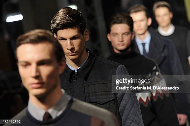 Models walk the runway during the Marras show as a part of Milan Fashion Week Menswear Autumn/Winter 2014 on January 13, 2014 in Milan, Italy.