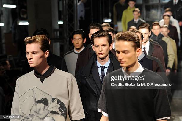 Models walk the runway during the Marras show as a part of Milan Fashion Week Menswear Autumn/Winter 2014 on January 13, 2014 in Milan, Italy.