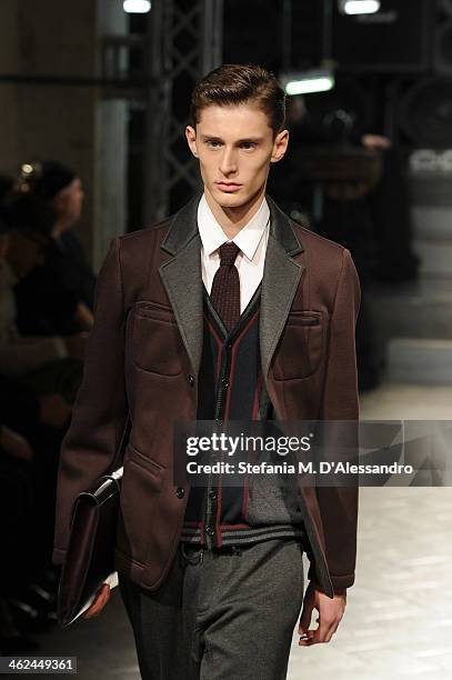 Model walks the runway during the Marras show as a part of Milan Fashion Week Menswear Autumn/Winter 2014 on January 13, 2014 in Milan, Italy.