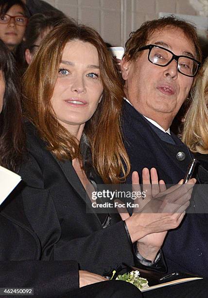 Carla Bruni Sarkozy and Gilles Dufour attend the Jean Paul Gaultier show as part of Paris Fashion Week Haute-Couture Spring/Summer 2015 on January...