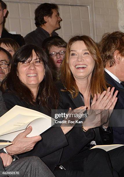 Emmanuelle Alt and Carla Bruni Sarkozy attend the Jean Paul Gaultier show as part of Paris Fashion Week Haute-Couture Spring/Summer 2015 on January...