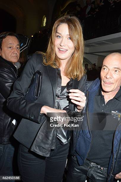 Carla Bruni Sarkozy and Pierre Commoy attend the Jean Paul Gaultier show as part of Paris Fashion Week Haute-Couture Spring/Summer 2015 on January...