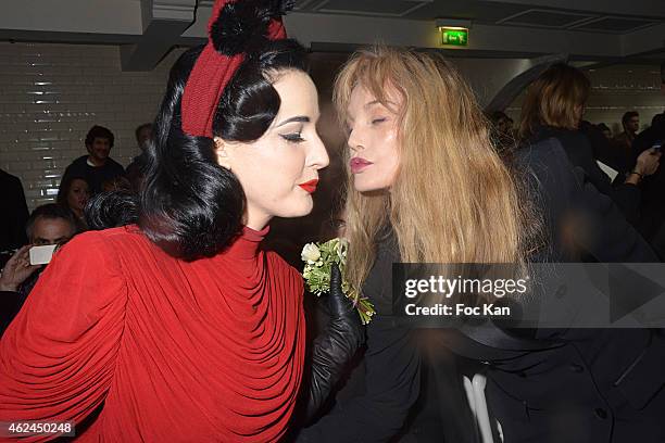 Dita Von Teese and Arielle Dombasle attend the Jean Paul Gaultier show as part of Paris Fashion Week Haute-Couture Spring/Summer 2015 on January 28,...
