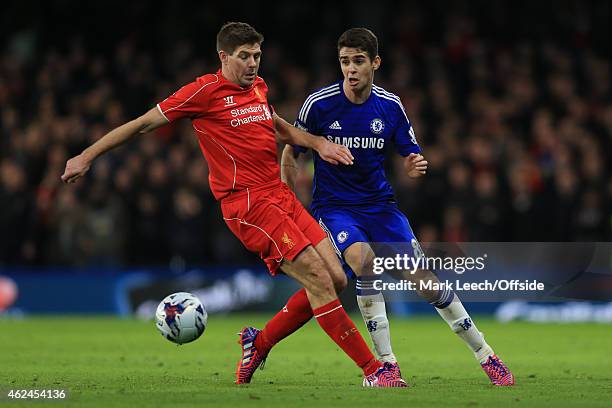 Steven Gerrard of Liverpool in action with Oscar of Chelsea during the Capital One Cup Semi-Final second leg between Chelsea and Liverpool at...