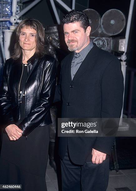 Composer Gustavo Santaolalla and wife Alejandra Palacios attend the "Amores Perros" Hollywood Premiere on March 27, 2001 at GCC Galaxy 6 Theatres in...