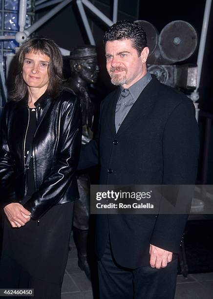 Composer Gustavo Santaolalla and wife Alejandra Palacios attend the "Amores Perros" Hollywood Premiere on March 27, 2001 at GCC Galaxy 6 Theatres in...