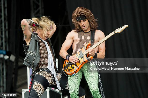 Vocalist Michael Starr and guitarist Satchel of American glam metal group Steel Panther performing live on the Stephen Sutton Main Stage at Download...