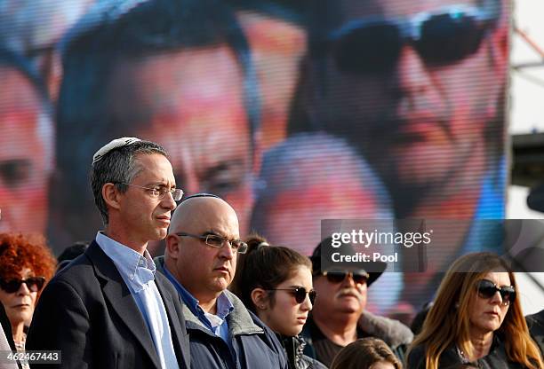 The sons of former Israeli Prime Minister Ariel Sharon, Gilad and Omri , attend their father's funeral near Sycamore Farm on January 13, 2014 in...