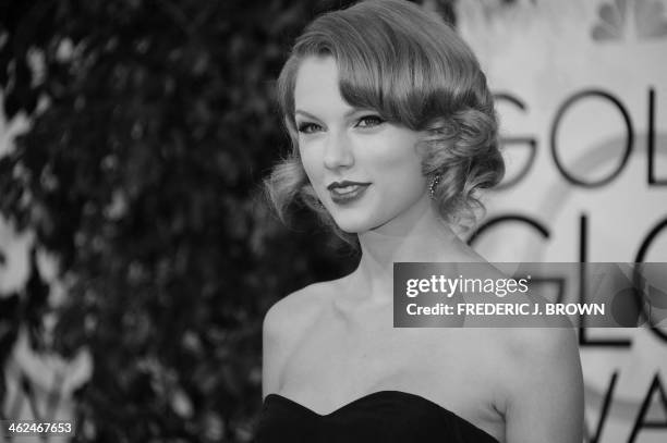Singer Taylor Swift arrives on the red carpet for the Golden Globe awards on January 12, 2014 in Beverly Hills, California. AFP PHOTO / Frederic J....