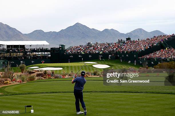 Hunter Mahan hits a tee shot on the 16th hole during the first round of the Waste Management Phoenix Open at TPC Scottsdale on January 29, 2015 in...