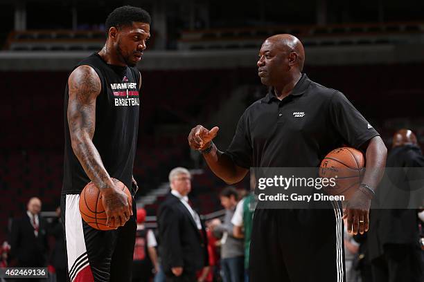 Keith Smart and Udonis Haslem of the Miami Heat work before the game against the Chicago Bulls on January 25, 2015 at the United Center in Chicago,...