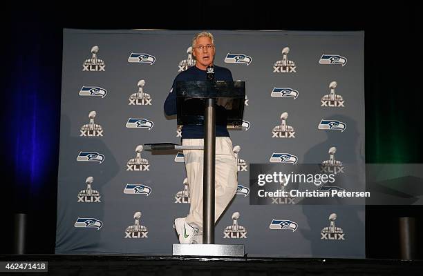 Head coach Pete Carroll of the Seattle Seahawks speaks during a Super Bowl XLIX media availability at the Arizona Grand Hotel on January 29, 2015 in...