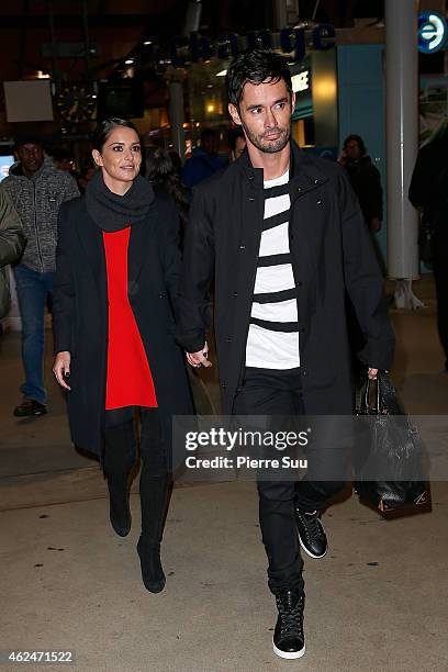 Cheryl Fernandez-Versini and Jean-Bernard Versini are seen at 'Gare du Nord' station on January 29, 2015 in Paris, France.