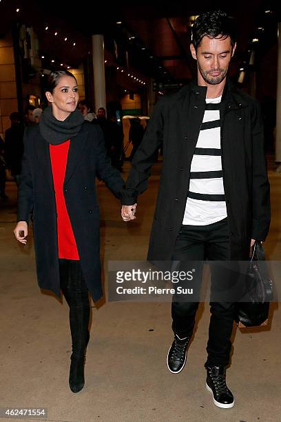 Cheryl Fernandez-Versini and Jean-Bernard Versini are seen at 'Gare du Nord' station on January 29, 2015 in Paris, France.