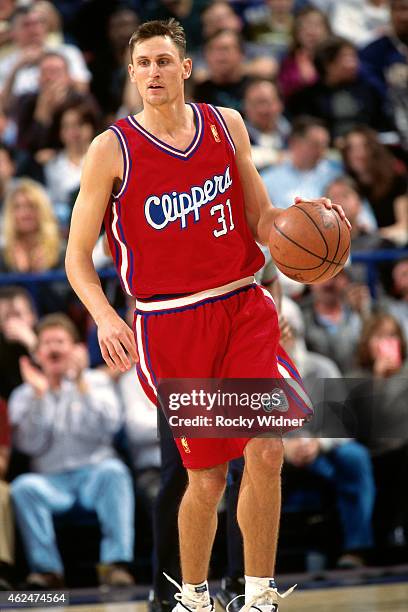 Brent Barry of the Los Angeles Clippers dribbles against the Sacramento Kings during a game circa 1997 at Arco Arena in Sacramento, California. NOTE...