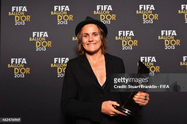 Women's World Player of the Year winner Nadine Angerer of Germany and Brisbane Roar poses with her award after the FIFA Ballon d'Or Gala 2013 at the...
