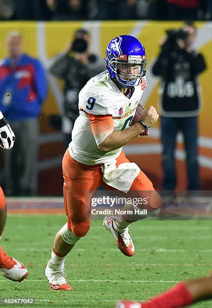 Grant Hedrick of the Boise State Broncos runs with the ball against the Arizona Wildcats at University of Phoenix Stadium on December 31, 2014 in...