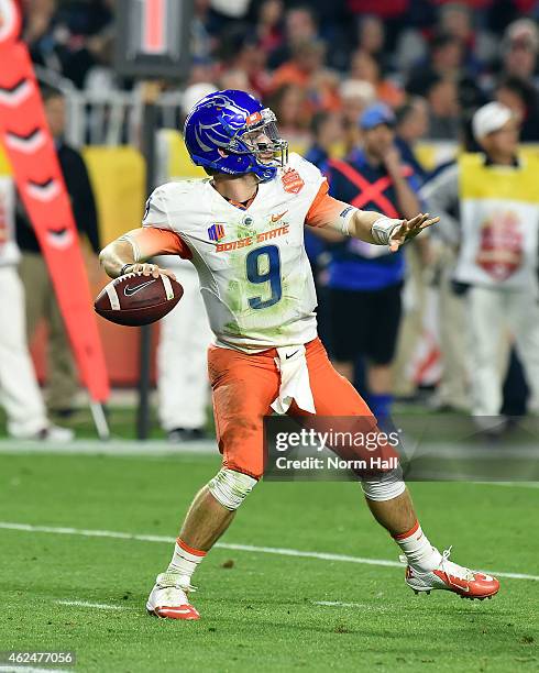 Grant Hedrick of the Boise State Broncos throws a pass against the Arizona Wildcats at University of Phoenix Stadium on December 31, 2014 in...