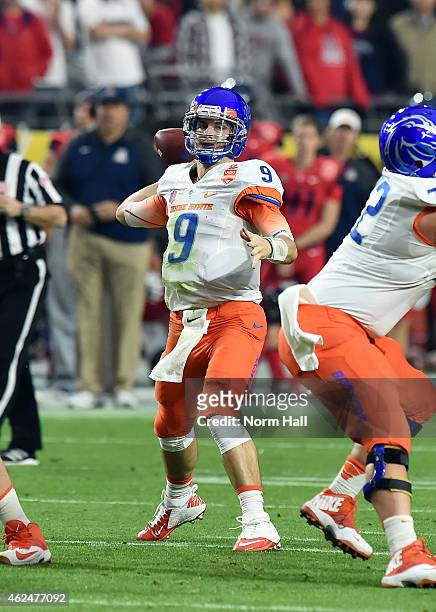 Grant Hedrick of the Boise State Broncos throws a pass against the Arizona Wildcats at University of Phoenix Stadium on December 31, 2014 in...