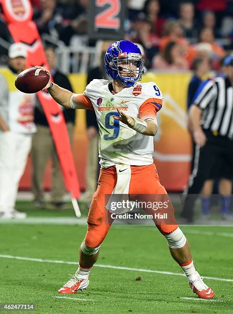 Grant Hedrick of the Boise State Broncos throws a pass against the Arizona Wildcats at University of Phoenix Stadium on December 31, 2014 in...