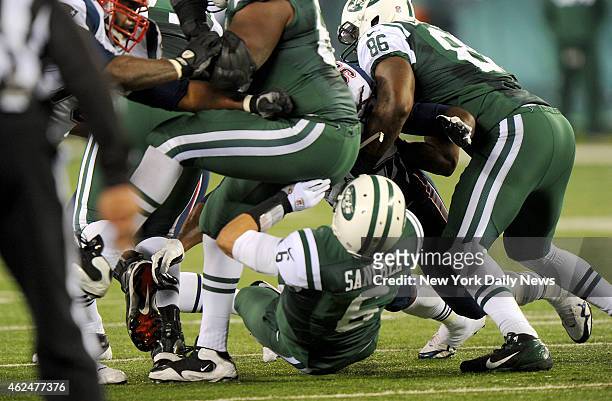New York Jets quarterback Mark Sanchez fumble in the first half when the New York Jets played the New England Patriots. Sanchez smacks into lineman...