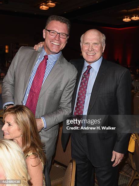 Analyst Howie Long and honoree Terry Bradshaw attend the Friars Club Roast of Terry Bradshaw during the ESPN Super Bowl Roast at the Arizona Biltmore...