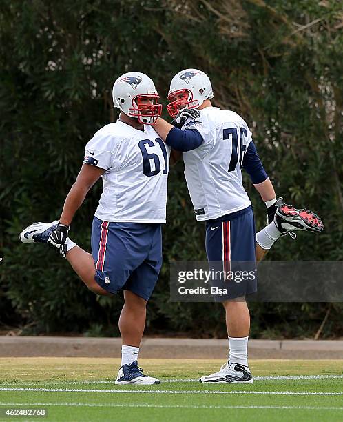 Marcus Cannon and Sebastian Vollmer of the New England Patriots stretch during the New England Patriots Super Bowl XLIX Practice on January 29, 2015...